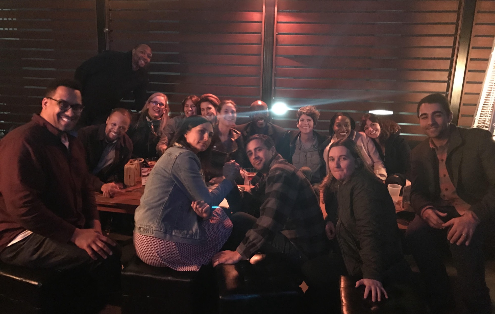 Bobby and about fifteen classmates gathered around a table at a dimly lit Los Angeles bar